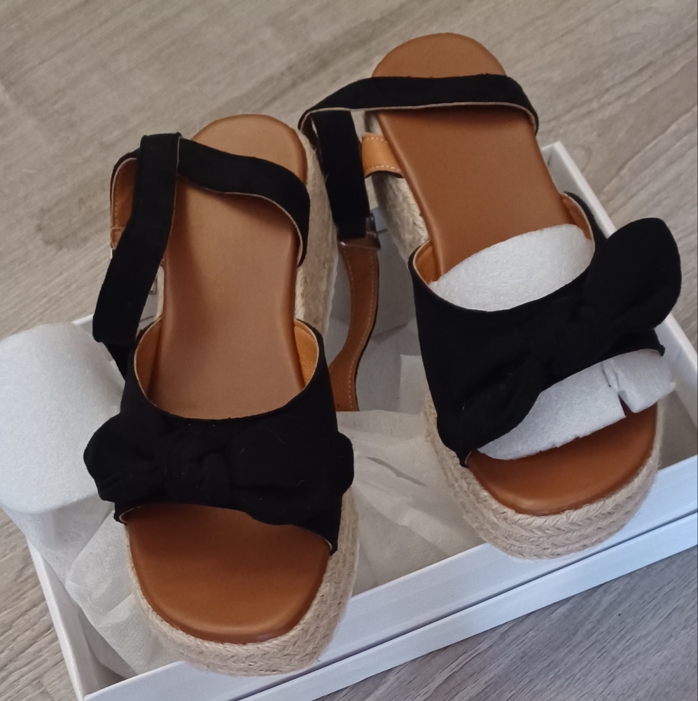 Women's espadrilles cute and can go with jeans or summer dress..  2" platform